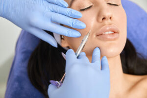 Cheek implants vs. fillers